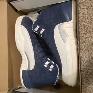 Jordan 12 “International Flight” (7Y)